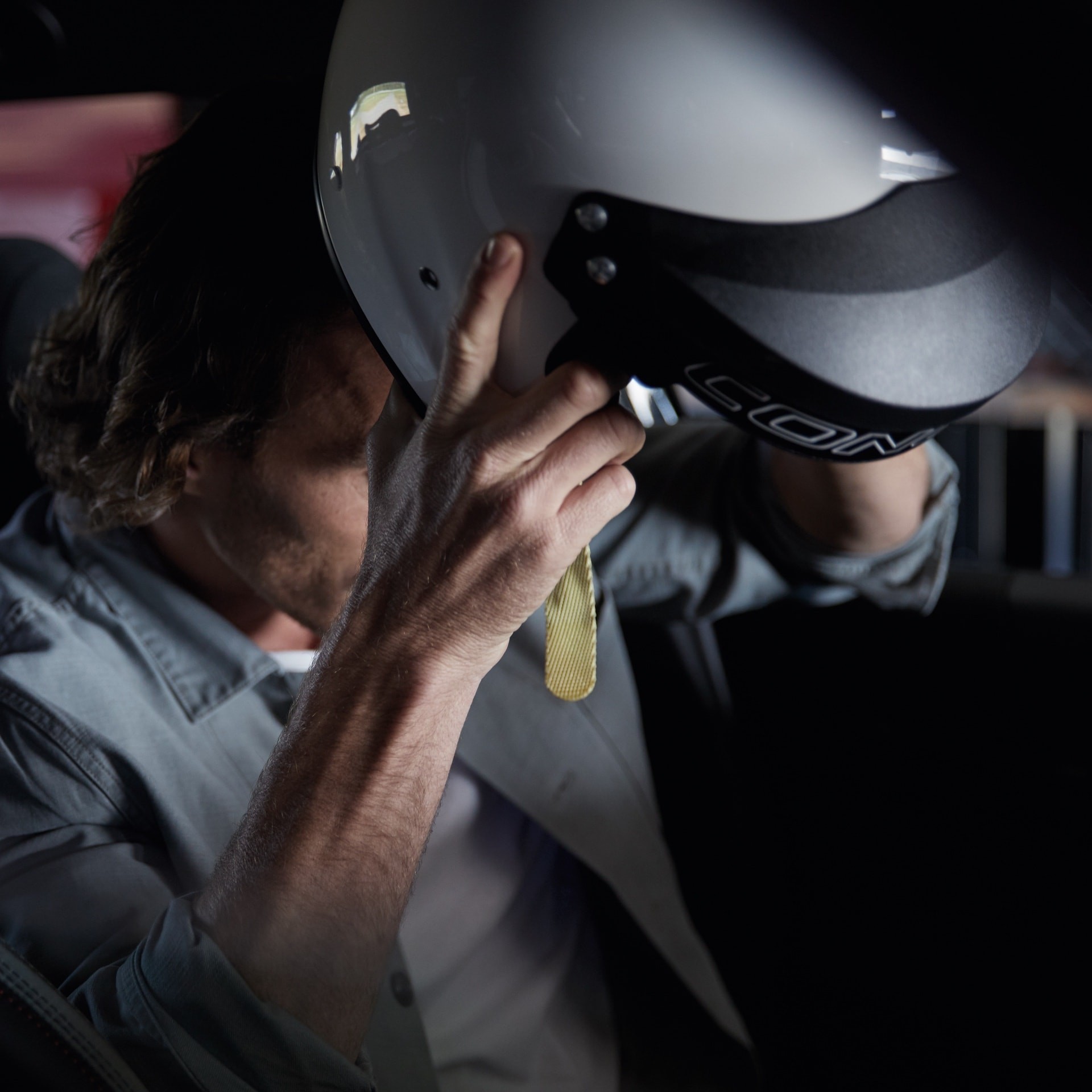 MINI John Cooper Works Clubman – interior – driver wearing helmut MINI John Cooper Works Clubman – interior – driver wearing helmut